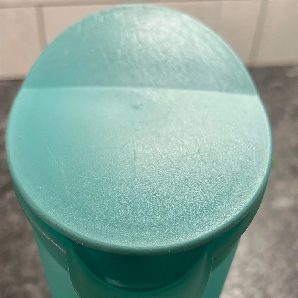 Slimline Aqua Pitcher with Lid by Tupperware.